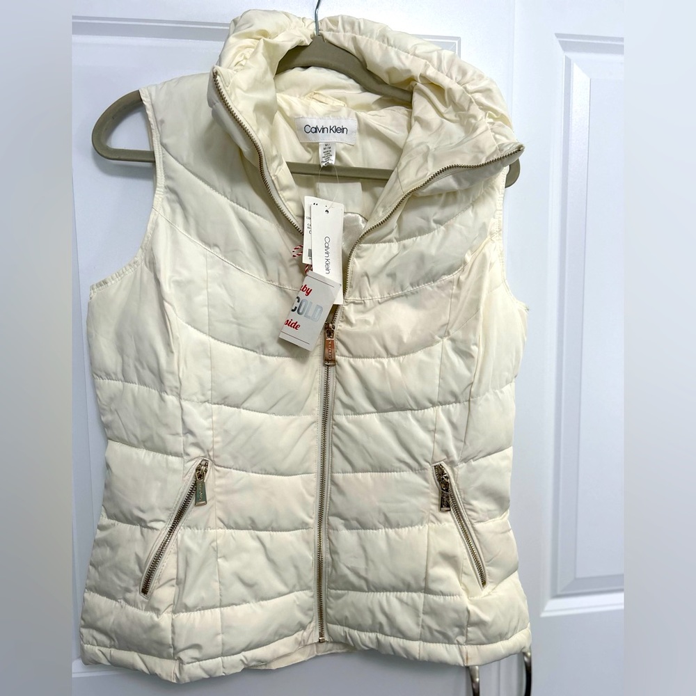 Calvin Klein white sleeves less vest.